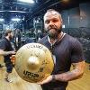 Donald holding signed cymbal